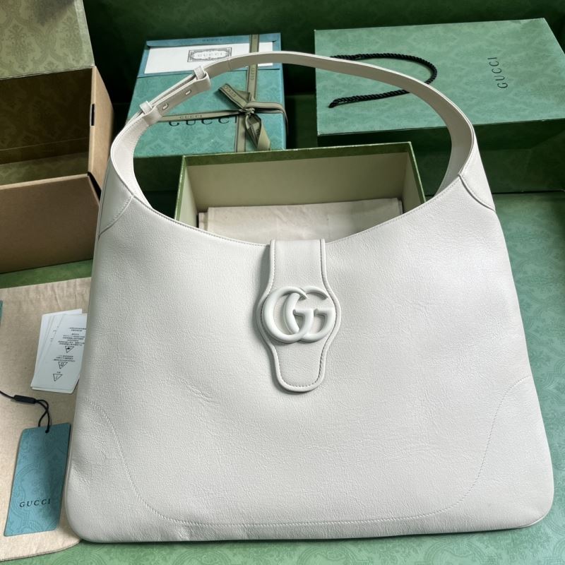 G*u*i top handle bags